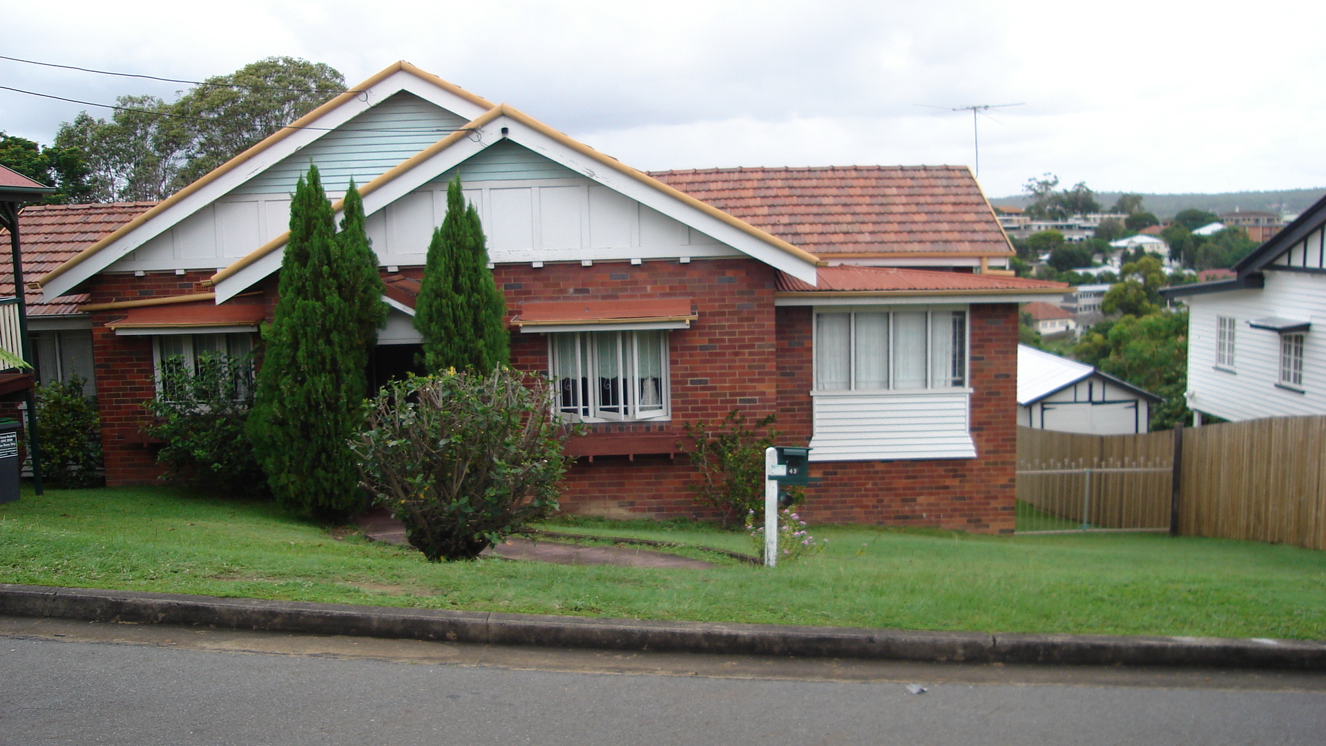 Before Renovation Snapshot Of A Red Brick Two Story House In Queensland