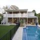 Large Garden With Black Fenced Long Pool And Modern Queenslander With Open Plan